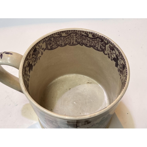 465A - An early 19th century pearlware, purple, transfer printed mug 