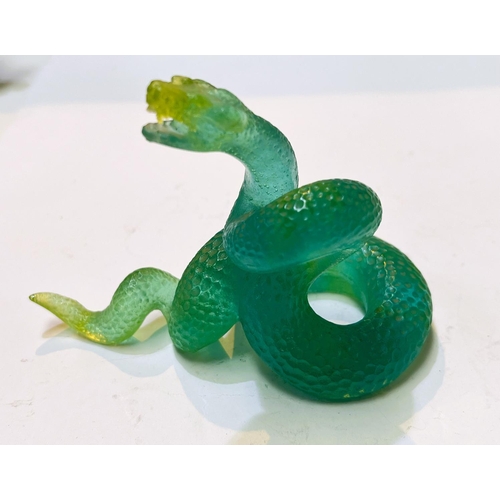 527 - Daum: Green glass coiled snake, signed, length 14cm