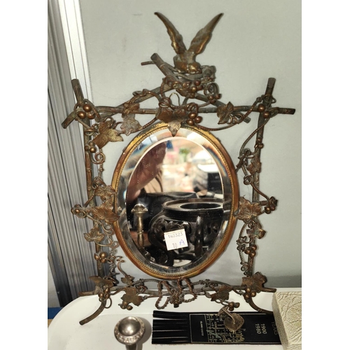 10A - A small brass hanging wall mirror with pierced grape and vine frame with bird atop, a selection of C... 