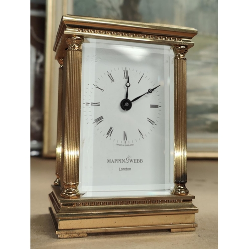 17B - A modern carriage clock by Mappin & Webb with battery powered mechanism, height 12cm