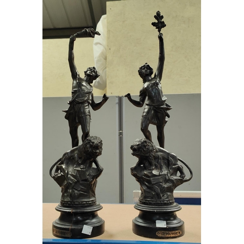 18A - A pair of bronzed spelter figures:  