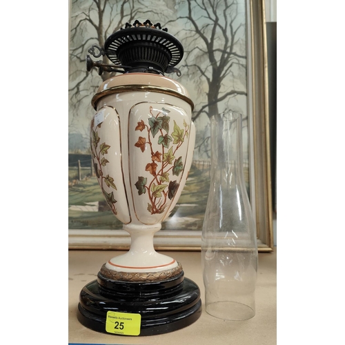 25 - A  Victorian pottery oil lamp decorated with ivy; a pair of large 'sanded' glass vases; etc.