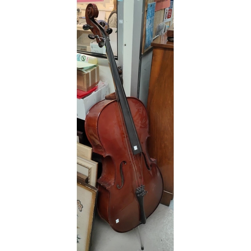 37 - A Modern good quality full size cello with two piece back, scrolling head decoration, L122cm