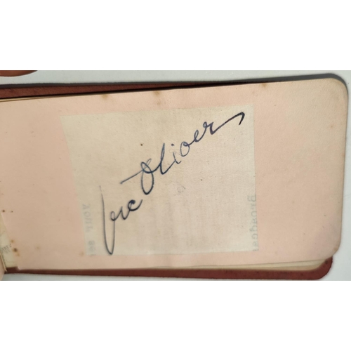 397 - An autograph album containing a selection of mid 20th century autographs