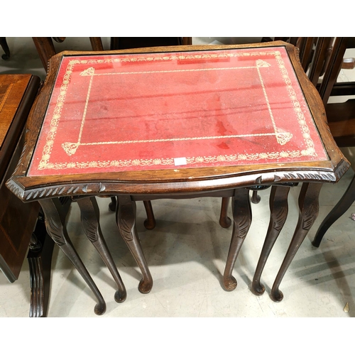 932 - A mahogany 2 height dropleaf tea trolley; a nest of 3 reproduction mahogany occasional tables