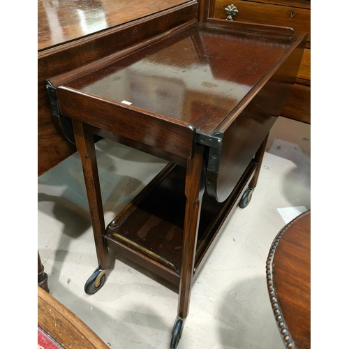 932 - A mahogany 2 height dropleaf tea trolley; a nest of 3 reproduction mahogany occasional tables