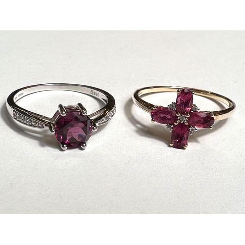 773 - A 9ct hallmarked ring set with 4 oval pink stones interspersed with clear stones size P/Q and a 9ct ... 