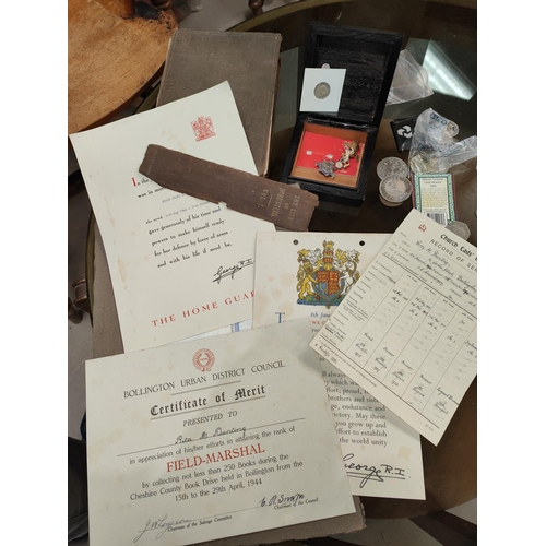 167 - A selection of military ephemera etc, two badges and a small collection of coins