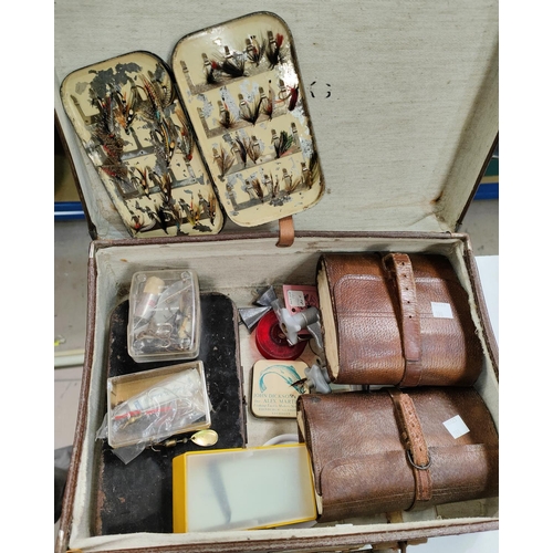 190 - A small case containing a Hardy Bros japanned metal fly box and flies, and other fishing equipment; ... 