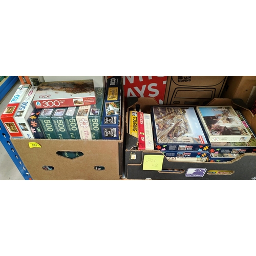 201 - A large selection of sealed and unsealed (not guaranteed complete) jigsaws of trains and other scene... 