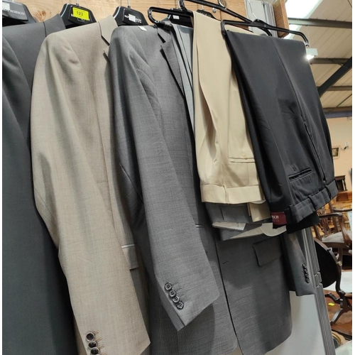 123 - Three gents' 'Roy Robson' suits:  light grey, dark grey & fawn, size medium/large approxNo bids ... 