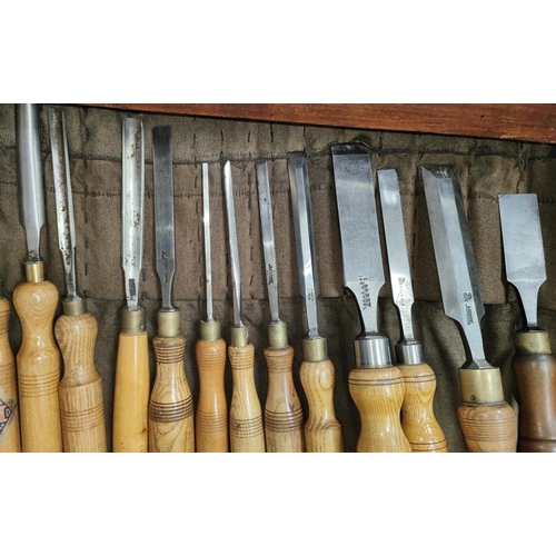 67A - A mixed set of variously sized vintage chisels, some named, a large McBean plane and two smaller pla... 