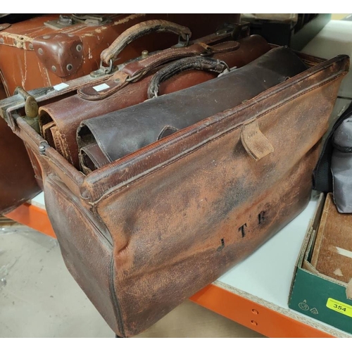 72 - A Gladstone bag; leather satchels