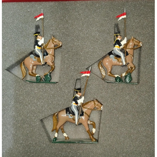 250A - A boxed set of hand painted Tradition soldiers set No 115 17th Lancers on horseback