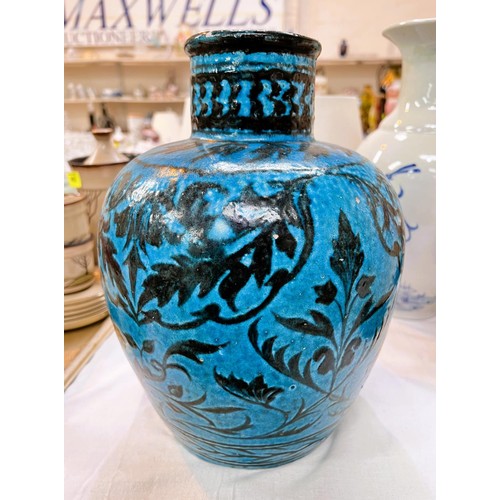 440 - A Large 19th century (possibly earlier) Persian Kashan vase in turquoise with darker vine decoration... 