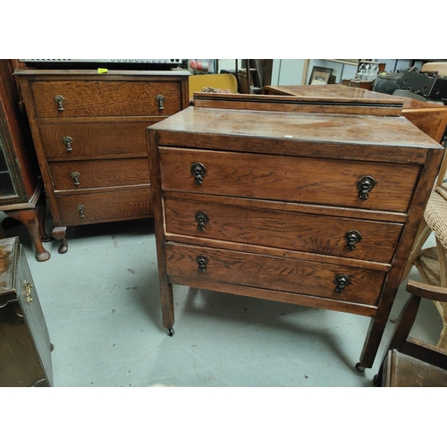 823 - A 1930's 4 height oak chest of drawers; a similar 3 height chest of drawers.