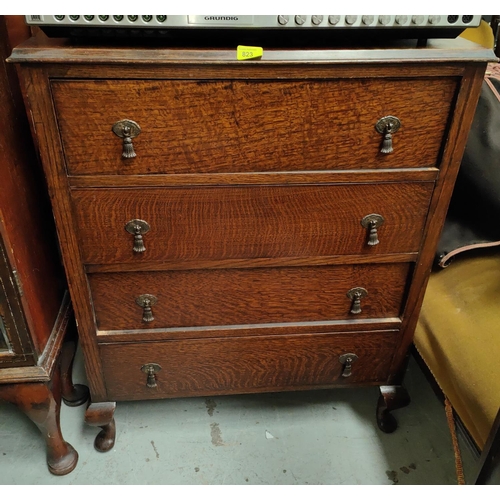 823 - A 1930's 4 height oak chest of drawers; a similar 3 height chest of drawers.