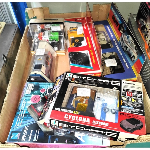 297 - A selection of various boxed remote controlled vehicles 