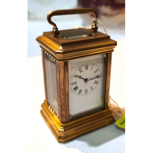 327 - A miniature brass cased carriage clock with time piece movement, ht. 8cm