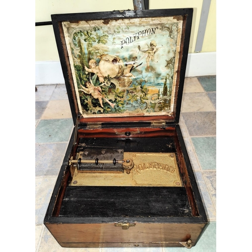 371 - A wooden cased polyphon player in working order, no disc