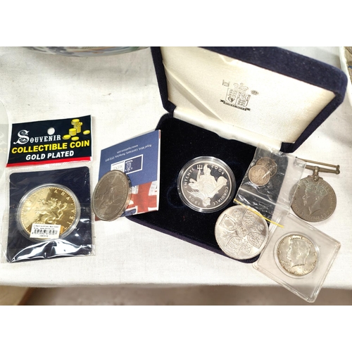 376 - A 2004 'Cordiale Entente' silver proof crown, with C.O.A; a 1964 Kennedy half dollar , a WWII War me... 