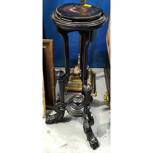 834 - A Victorian ebonised torchiere with tripod stand circular top with metal fittings and carved detail,... 