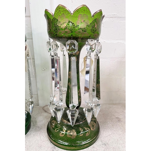 456B - A Victorian green glass lustre with gilt decoration and faceted drops, ht. 32cm