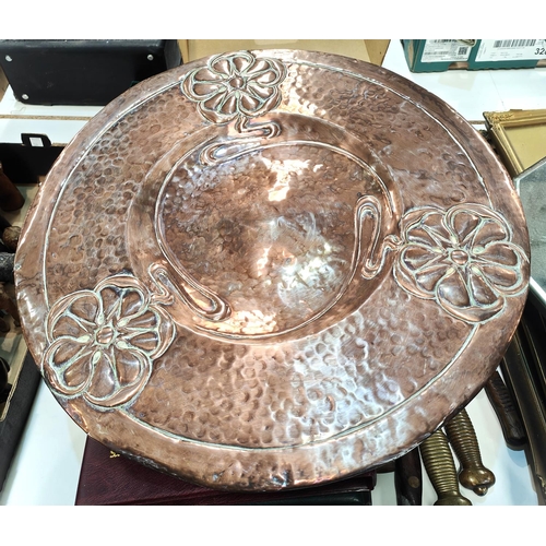 204 - A circular Art Nouveau beaten copper plaque, diameter 55cm