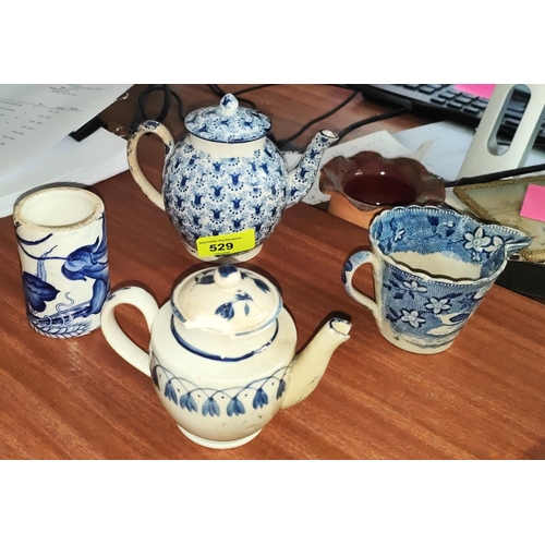 529A - An 18th century English pearlware teapot, height 11cm; another (a.f.); 2 other items