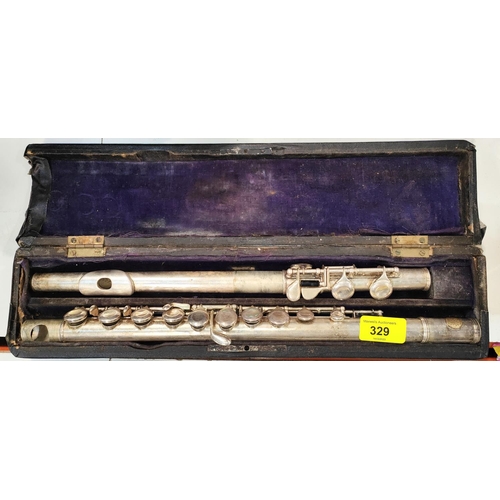 329 - A vintage silver plated Selmer flute, cased