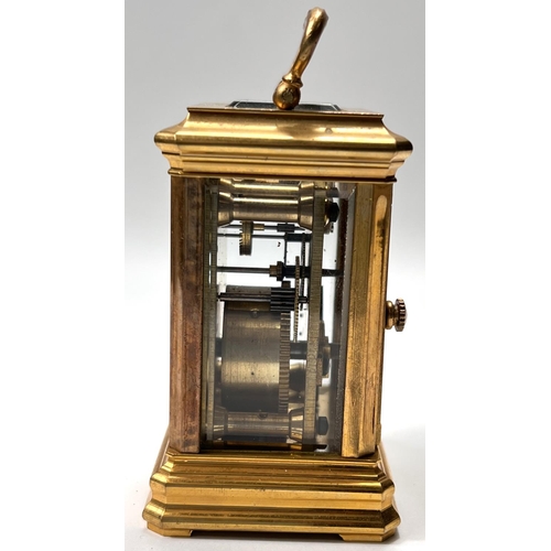 327 - A miniature brass cased carriage clock with time piece movement, ht. 8cm