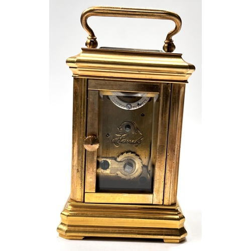 327 - A miniature brass cased carriage clock with time piece movement, ht. 8cm