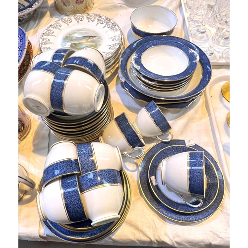 485 - A seven piece part fish service; a Grosvenor china part blue and white tea service