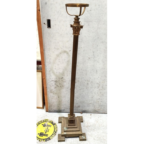 994 - A brass Corinthian column with stepped base 