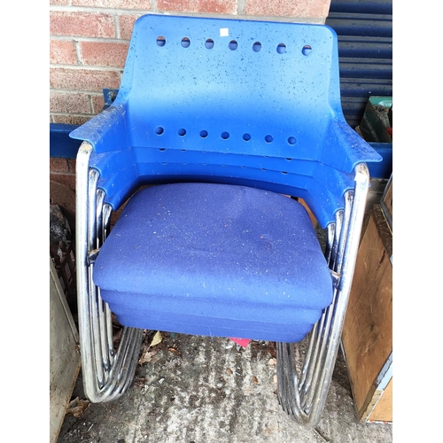 999 - A set of 4chrome framed moulded blue plastic stacking chairs