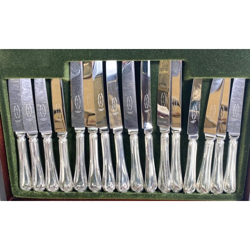 666 - A six setting canteen of silver plated cutlery by George Wood & Sons in fitted case; a cased fis... 