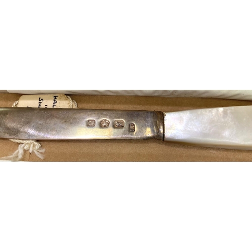 668 - A hallmarked silver presentation knife with mother-of-pearl handle; 2 silver propelling pencils; a s... 