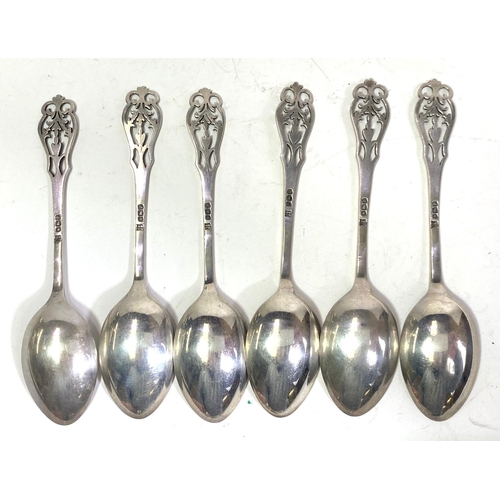 769 - A set of 6 hallmarked silver Art Nouveau teaspoons with pierced terminals and a matching pair of ton... 