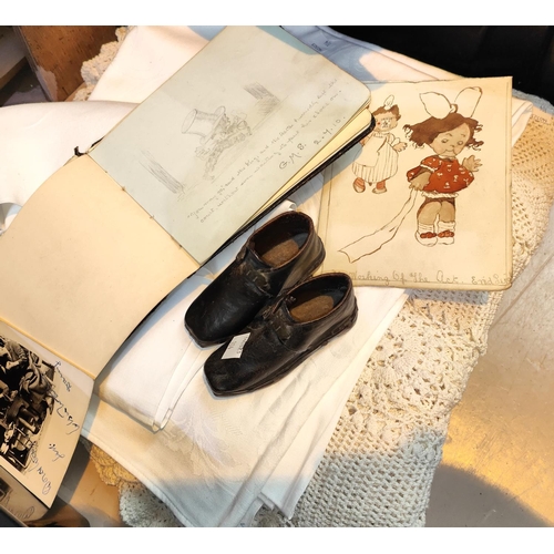 104 - Two mid 20th century autograph books; a selection of lace; linen; etc.