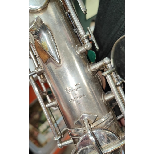 69 - An alto saxophone, cased Conn with Selmer Mouthpiece serial 278584