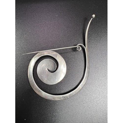 660 - Georg Jensen:  a large brooch, openwork scroll, 