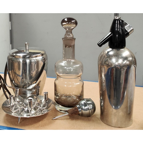 14 - A vintage Caithness smoky glass decanter, a soda syphon etc, a large rustic metal candelabra and a s... 