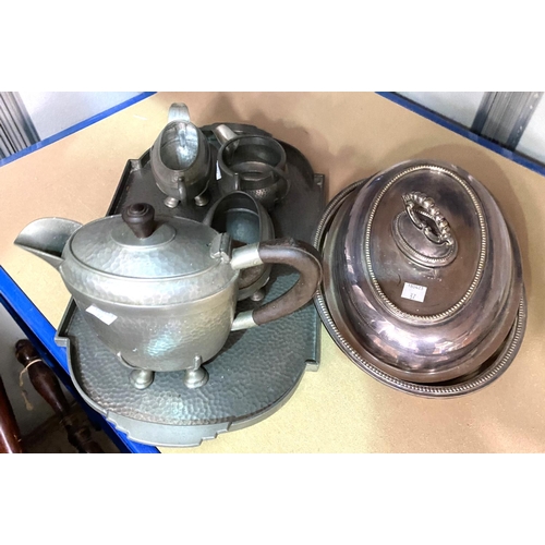 37 - An Arts and Crafts style 4 piece beaten pewter tea set and tray 