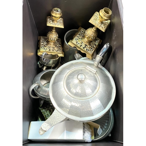 43 - A 1930's pewter tea set; ornate brass candlesticks; etc.