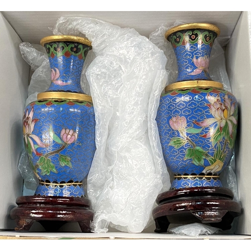 44 - A modern pair of cloisonné vases; an eastern tri-coloured metal plaque; a toast rack