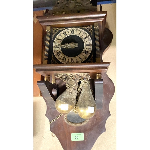 55 - A reproduction wall hanging lantern clock with twin weights