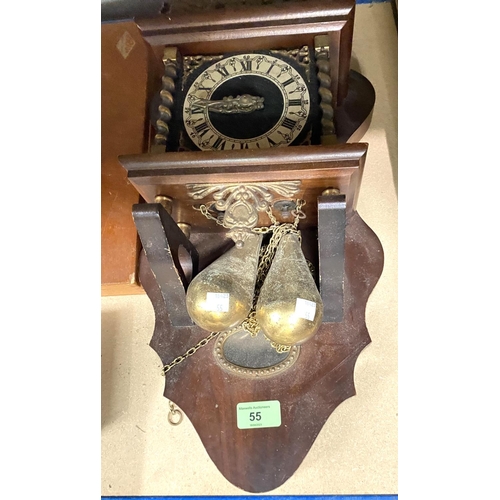 55 - A reproduction wall hanging lantern clock with twin weights