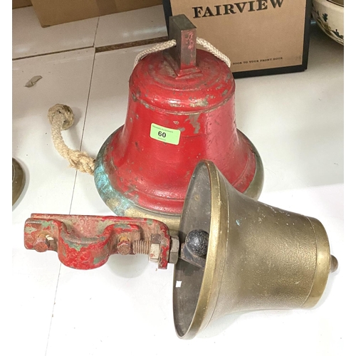 60 - A large brass fire bell; a brass bell with sprung hammer, dia. 19cm and 26cm