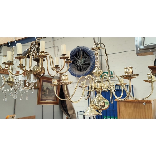 1060 - A period style brass 6 branch brass centre light; A period style brass 8 branch brass centre li... 