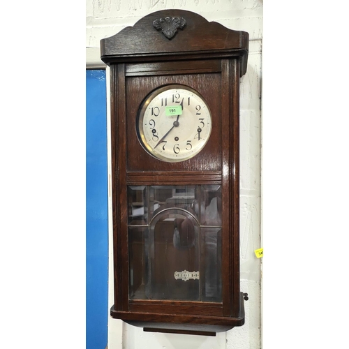 191 - A 1920's chiming wall clock in oak case; a 1930's mantel clock with Westminster chime; a mantel cloc... 